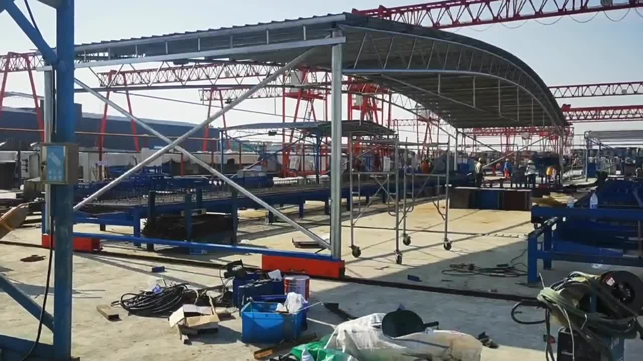 南京移动钢筋棚电动彩轨道伸缩式钢筋加工棚
